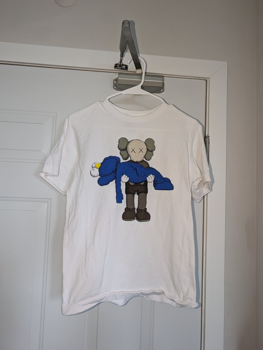 White KAWS Uniqlo TShirt
